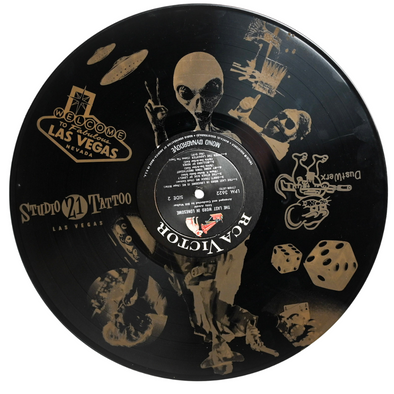 Studio 21 Tattoo Las Vegas NV Vino & Vinyl Record Art Show Hand Painted Record Laser engraved alien and vegas themed All Proceeds go to Charity 