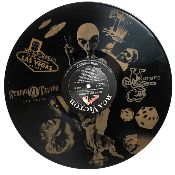 Studio 21 Tattoo Las Vegas NV Vino & Vinyl Record Art Show Hand Painted Record Laser engraved alien and vegas themed All Proceeds go to Charity 