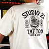 Studio 21 Tattoo Las Vegas NV Vino & Vinyl cream and black t-shirt with vino & vinyl graphic 