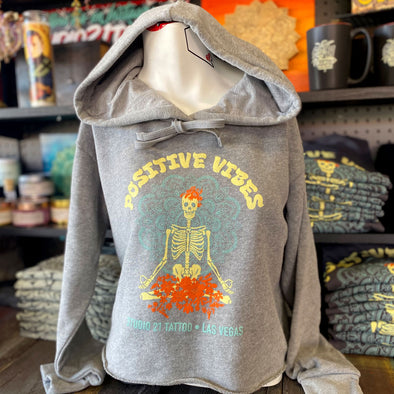 Studio 21 Tattoo Las Vegas NV  Positive vibes Hoodie with skeleton graphic with colorful studio 21 logo 